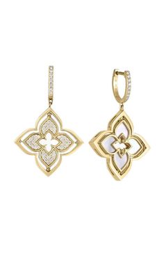 two tone gold and diamond earrings with flower design on the front, set against a white background