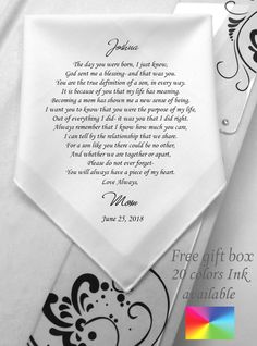 the wedding handkerchief is decorated with black and white designs on it's side, along with a poem written in cursive writing