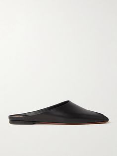 The refined, understated design of Alaïa's mules will elevate so many outfits. They're made from soft black leather and have a angular cutout at the square toes. Classic Evening Mules In Calf Leather, Sleek Black Mules With Leather Sole, Modern Leather Mules For Evening, Elegant Black Mules With Leather Sole, Sleek Calf Leather Mules For Spring, Spring Black Calf Leather Mules, Black Calf Leather Mules For Evening, Elegant Black Calf Leather Mules, Elegant Black Business Mules