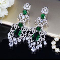 18k White Gold Plated Green Earrings Luxury Pierced Chandelier Earrings For Anniversary, Elegant Hoop Earrings With 17 Jewels For Wedding, Luxury Green Teardrop Earrings, Luxury Pierced Chandelier Earrings For Formal Events, Luxury Green Clip-on Earrings, Luxury Green Clip-on Earrings For Formal Occasions, Green Luxury Earrings, Luxury Green Pierced Earrings, Green Luxury Pierced Earrings