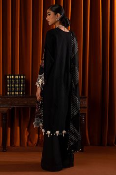 Brand: Sana SafinazProduct Code: M243-009B-3CPCollection: Muzlin by Sana Safinaz Unstitched Winter CollectionFabric: Slub DESIGN DETAILS: Embroidered Front Kali On Slub 3 Pieces Dyed Back On Slub 1.20 Meters Embroidered Sleeves On Slub 0.65 Meters Embroidered Kuful On Organza 2 Pieces Embroidered Shawl 2.5 Meters Dyed Cotton Pants 1.75 Meters DISCLAIMER:* Lining, Laces, and Tassels are not included in unstitched variants.* Embellishment items in stitched outfits are subject to market availability.* Product color may vary due to photographic lighting or your device settings. CARE INSTRUCTIONS: Extra Fabric Has Been Used For Shoot Original Color May Vary Slightly From The Picture Dry Clean Recommended Iron The Clothes At Moderate Temperature Do Not Use Bleach, Or Stain Removing Chemicals Dam Embroidered Jamawar Palazzo Set With Traditional Drape, Designer Mulmul Palazzo Set With Resham Embroidery, Formal Unstitched Palazzo Set With Resham Embroidery, Eid Palazzo Set In Mulmul With Cutdana Detail, Traditional Drape Sharara With Resham Embroidery, Traditional Cambric Sharara With Resham Embroidery, Unstitched Formal Palazzo Set With Dabka Work, Formal Embroidered Chanderi Palazzo Set, Formal Unstitched Palazzo Set With Dabka Work