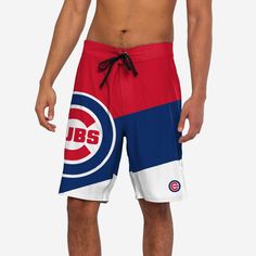 *SEP* *SEP* Dominate summer style the same way your team dominates their opponents. These Chicago Cubs Cropped Logo Colorblock Boardshorts will have you ready for every pool party, beach day, and barbecue. Features Diagonal, multi-team colored design so you can let your true colors shine Large cropped team logo on front right leg that lets you show off your legendary team spirit AND your toned calf muscles Small team logo on front left leg so there's no question who you're rooting for Elastic wa Team-colored Summer Shorts, Team-colored Short Bottoms For Summer, Team-colored Bottoms For Summer Sports Events, White Summer Shorts For Water Sports, Team-colored Bottoms For Summer Sports, White Sporty Swim Trunks For Water Sports, White Shorts For Water Sports In Summer, Team Spirit Athletic Shorts For Summer, Summer Team Spirit Athletic Shorts