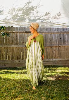 "Add a touch of unique style to your wardrobe with our Hand-Dyed Kaftan Dress! This stunning dress is made from 100% breathable and comfy rayon fabric, ensuring maximum comfort all day long. Using our unique method, each dress is carefully hand dyed, resulting in a one-of-a- kind masterpiece. The intricate patterns and vibrant colors make this dress a true work of art. The kaftan dress comes in a versatile one size fits most (S-3XL), making it extremely comfortable for a wide range of body types. With a bust measurement of up to 60\", you can feel confident that this dress will flatter your figure. The dress measures 55\" in length and 45\" in width, providing a loose and flowing fit that is both stylish and flattering. Featuring a trendy V-neck design and side slits, this slipover style d Green Bohemian Maxi Dress With Relaxed Fit, Spring Bohemian Hand Dyed Kaftan, Spring Bohemian Hand-dyed Kaftan, Tie Dye Clothing, Tye And Dye, Dress Loose Fit, Poncho Dress, Tie Dye Outfits, Dye Dress