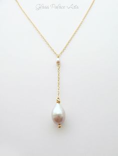 "Beaded Freshwater Pearl Necklace ~ Available in genuine 14k gold fill, rose gold fill or sterling silver Capture the beauty of genuine pearls with this tear drop pearl necklace - The length of the chain that goes around the neck not including the dangle section is shown at 18\" length - Please measure to get the right length for you. - The pearl dangle is an added 2 1/2 inches - These genuine freshwater pearls have a gorgeous luster - Chain can be made in 14k gold filled, sterling silver or ros Delicate Yellow Gold Drop Necklace For Wedding, Yellow Gold Pear Drop Necklace For Wedding, Wedding Yellow Gold Briolette Drop Necklace, Delicate Rose Gold Pear-shaped Jewelry, Rose Gold Single Strand Jewelry For Wedding, Yellow Gold Drop Necklace For Wedding, Briolette Single Strand Jewelry For Wedding, Single Strand Briolette Jewelry For Wedding, Teardrop Lariat Necklace For Wedding