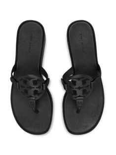 black leather smooth grain signature Double T motif stud detail round open toe slip-on style thong strap branded footbed wedge heel flat sole This item is in size 7½ and the color is Black Tory Burch Sandals Black, Tory Burch Sandals, Tory Burch Miller, Tory Burch Miller Sandal, Pumps Flat, Leather Slides, Crossbody Tote, Thong Sandals, Leather Accessories