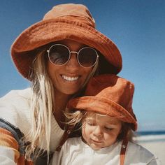 "The perfect toddler sun hat! Made from 100% cotton rust corduroy makes this hat very comfortable to wear. A great sun hat for toddlers and babies. I made this hat with a day of adventure this fall, also makes a perfect gift! This listing is for a baby or child size hat, for matching Adult hat see link below. This hat is made from a tan 100% cotton corduroy fabric.  Inside liner is white cotton.  All baby and child sizes come with chin straps. Brim measures approx. 2.5\" wide. Crown measures app Orange Cotton Bucket Hat For Summer, Summer Orange Cotton Bucket Hat, Adjustable Orange Cotton Bucket Hat, Orange Cotton Bucket Hat, Casual Adjustable Orange Sun Hat, Adjustable Orange Sun Hat With Curved Brim, Casual Orange Adjustable Sun Hat, Adjustable Wide Brim Orange Sun Hat, Orange Adjustable Wide Brim Sun Hat