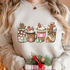 Gingerbread Christmas Coffee Shirt, Christmas coffee Sweatshirt, women Holiday sweater, Xmas Tee, Coffee Lover gift Suitable for many occasions such as Christmas, Father's Day, Mother's Day, birthday This classic crew-neck sweatshirt is an essential basic item for anyone’s wardrobe. The ribbed cuffs on the sleeves and waist are reinforced, and the high-quality cotton ensure that anyone will enjoy this cuddly and cool sweatshirt for many moons to come. Preshrunk fleece knit Double-needle stitchin Xmas Tees, Coffee Tees, Coffee Sweatshirt, Coffee Lover Gift, Gingerbread Christmas, Coffee Shirt, Coffee Print, Sweatshirt Women, Coffee Shirts