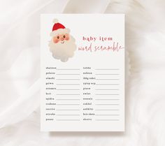 a baby shower game with a santa clause on it's face and the words, baby