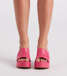 Give off fabulous vibes in these of-the-moment platform mules! They feature an open almond-shaped toe. a wide banded toe strap. an open back for easy on-and-off styling. a platform sole. and a thick block heel. Pair with a quilted handbag.Fit & Features Open almond-shaped toe Wide banded toe strap Open back Platform sole Thick block heel Faux leather material. subtle cushioned insole Runs true to size Trendy Summer Platform Slippers With Heel Loop, Chic Summer Platform Slippers With Chunky Platform, Trendy Mules With Wedge Heel And Heel Loop, Chic Platform Slide Slippers, Spring Open Toe Platform Slippers With Heel Loop, Spring Platform Slide Mules, Trendy Summer Clogs For Party, Spring Chunky Platform Open Heel Slippers, Chic Summer Platform Mules