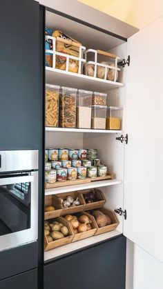 an open pantry door with food in it