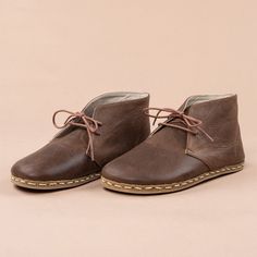 "Our Atlantis Handmade barefoot boots combine high-quality leather and traditional shoemaking skills. It is only through our know-how and belief in barefoot boots, a wealth of experience, and the best materials that we are able to create this unique and top-quality shoe. - Made in Turkey - 100% Natural - 100% Handmade - Hand-Stitched - Ankle Boots with Laces - Natural Leather Upper - Natural Leather Lining - Water Buffalo Leather Sole What are Barefoot Shoes? It is time to feel...EVERYTHING Bare Brown Leather Sole Desert Ankle Boots, Brown Ankle-high Desert Boots With Rubber Sole, Brown Lace-up Desert Boots With Stitched Sole, Brown Ankle-high Desert Boots With Leather Sole, Brown Leather Sole Chukka Boots, Brown Leather Sole Desert Boots Closed Toe, Brown Desert Boots With Stitched Sole And Closed Toe, Brown Leather Sole Desert Boots, Brown Leather-lined Lace-up Desert Boots