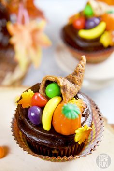 chocolate cupcakes decorated with candy and candies