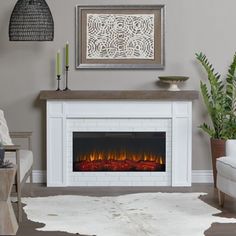 a living room with a fire place in the center and a rug on the floor