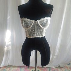 Strapless White Lace Bustier Never Worn Fitted White Lace Tube Top, Strapless Lace Crop Top For Party, Strapless Bra-friendly Crop Top For Party, Strapless Bra Friendly Crop Top For Party, Elegant Fitted Bra With Lace Top, Fitted Sweetheart Neckline Bra-friendly Tube Top, Elegant Strapless Bra-friendly Crop Top, Feminine Strapless Crop Top For Night Out, Fitted Bandeau Bra For Night Out