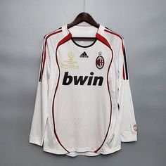 a soccer jersey hanging on a hanger