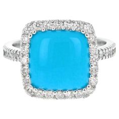 4.00 Carats Impressive Natural Turquoise and Diamond 14K White Gold Ring Suggested Replacement Value $4,400.00 Total Natural Oval Turquoise Weight is: Approx. 3.30 Carats Turquoise Measures: 10.00 x 10.00mm Natural Round Diamonds Weight: Approx. 0.70 Carats (color G-H / Clarity SI1-SI2) Ring size: 7 (free re-sizing available) Ring total weight: 5.7 grams Disclaimer: all weights, measurements and colors are approximate and may vary slightly from the listed dimensions or as seen in the image. All Wedding Ring For Her, Promise Ring Gift, Gold Cocktail Ring, Etsy Gold Ring, Art Deco Engagement, Diamond Cocktail Rings, Deco Engagement Ring, Art Deco Engagement Ring, 14k White Gold Ring