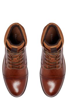 This smart lace-up boot combines the utilitarian treaded sole and cushioned heel of a traditional hiker style with the sophistication of a cap-toe derby. Leather upper/synthetic lining and sole Made in Portugal Brown Cap Toe Lace-up Winter Boots, Winter Cap Toe Lace-up Boots With Brogue Detailing, Winter Lace-up Cap Toe Boots With Brogue Detailing, Winter Lace-up Boots With Brogue Detailing And Cap Toe, Winter Lace-up Chukka Boots With Goodyear Welt, Brown Cap Toe Lace-up Boots For Winter, Lace-up Boots With Rubber Toe Cap For Fall, Winter Lace-up Cap Toe Boots With Leather Sole, Winter Lace-up Boots With Cap Toe And Leather Sole