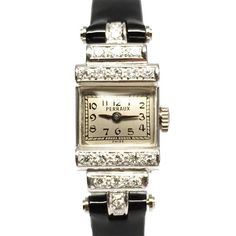 1950s Vintage Perraux Platinum and Diamonds Tuxedo Style Ladies WatchThe history of this watch dates it to the 1950s.  Perraux was a private label of a small New York city jewelry store that was in buisness from before WWII to the early 1960s.  Perraux watches were sold by the Sussaman & Medney Jewelry store at 65 Nassau st. from 1940 onward.  Like many exclusive jewelry shops at the time, the Swiss made movements were imported and fitted with custom designs exclusive to the jewelry store. Vintage Diamond Watch With Polished Finish For Wedding, Vintage Formal Watches With Single Cut Diamonds, Vintage Silver Diamond Watch, Vintage Evening Diamond Watch With Accents, Vintage Platinum Diamond Watch With Polished Finish, 1950s Jewelry Style, 1950s Jewelry, Art Deco Watch, Vintage Watches Women