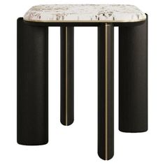 a black and white marble topped table with gold trim around the top, on a white background