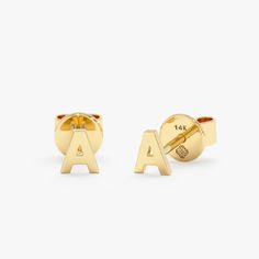 Ivory Wear your initials with joy and make a personalized statement with these dainty Custom Solid Gold Initial Studs. These earrings are crafted from 14k solid gold (available in yellow, white, and rose gold) and feature a single, capital letter of your choice. A perfect way to showcase your individuality or celebrate a special someone with their initial. - Handmade - Solid Gold- Post: 11 mm - Dimensions: 4 mm All Sarah Elise stud earrings come beautifully boxed in suede pouches you can always Small Gold Earrings, Memory Ring, Initial Earrings Studs, Solid Gold Bracelet, Initial Earrings, Mini Gold, Mini Studs, Handmade Fine Jewelry, Solid Gold Earrings