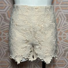 Anthropologie Foxie Doxie Ivory Lace High Waisted Shorts. Fits Like A Size 4. Never Worn. Size Xs Beige Lace Bottoms For Spring, Spring Beige Lace Bottoms, Spring Lace Beige Bottoms, Fitted Cream Bottoms With Lace Trim, Chic Beige Lace Bottoms, Spring Beige Bottoms With Lace Trim, Chic Cream Lace Bottoms, Feminine Off White Bottoms For Summer, Feminine Off White Summer Bottoms