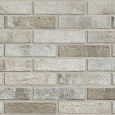 a white brick wall with no mortars or mortars on the bottom and sides