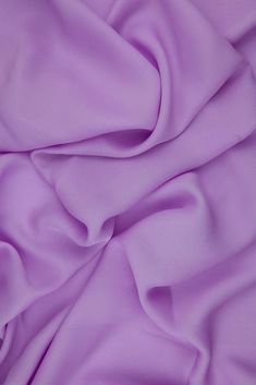 Lavendula Silk Double Georgette Fabric is a remarkably durable, lightweight premium silk that offers an extremely graceful drape and a soft, dull finish. This fabric is ideal for blouses, gowns, dresses, and overlays. The fabric's soft, airy appearance also makes it suitable for scarves and other accessories. The fabric is sold by the Yard, and measures 44 inches in width. Georgette Fabric, Fabric By The Yard, Silk Fabric, Gowns Dresses, Soft Fabrics, Blouses, Yard, Yarn, Silk