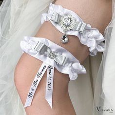 ❤️If you want to buy wedding gartes in a different color - https://www.etsy.com/shop/VIZZARA?ref=seller-platform-mcnav§ion_id=18699848 ❤️Choose a set of wedding items in a different color - https://www.etsy.com/shop/VIZZARA?ref=simple-shop-header-name&listing_id=518552067§ion_id=19090161 ❤️Items from this collection - https://www.etsy.com/listing/760494306/ ️🤵🏼Elevate the essence of your wedding day with our exquisite Set of 2 White and Silver Garters, a perfect blend of tradition and personalized elegance. Crafted with meticulous attention to detail, these garters are more than just accessories--they are symbolic keepsakes that encapsulate the spirit of your special day. The garters come in a classic white hue, symbolizing purity and grace, while the silver accents add a touch of sophis Silver Fitted Bridal Accessories, Adjustable Silver Bridal Accessories For Anniversary, Adjustable Silver Bridal Belt For Wedding, Silver Adjustable Bridal Belt For Wedding, Adjustable Silver Bridal Accessories For Marriage, White And Silver Wedding, White Garters, Wedding Personalized, Wedding Garters