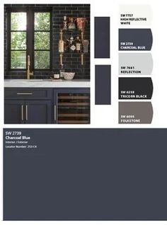 the color scheme for this kitchen is dark gray