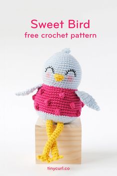 a crocheted bird sitting on top of a wooden block with the text sweet bird free crochet pattern