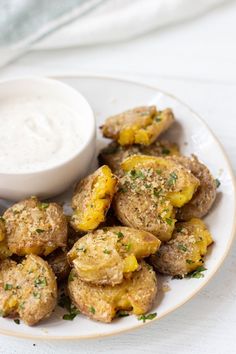 Smashed fingerling potatoes on a plate with a bowl of ranch. Smashed Fingerling Potatoes, Potatoes Smashed, Fingerling Potatoes, Garlic Butter Sauce