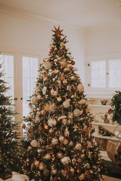 a decorated christmas tree in a living room