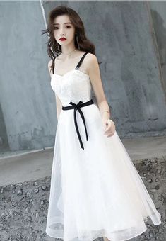 White Short Straps Party Dress Graduation Dress, White Homecoming DressesMaterial:tulleColor:as picture or custom colorNeckline:spaghetti strapBack details:lace-upDress type:a-lineStyle:cute&ltp&gtFeatures:lace&lt/p&gt&ltbr/&gt&ltp&gtThis dress could be custom made, there are no extra cost to do custom size and color.&lt/p&gt&ltbr/&gt&ltp&gt1, If the color is customized, please note the color & card number.&lt/p&gt&ltbr/&gt&ltp&gt2,You can choose standard size or custom size . If dress is custom Lace Party Dress With Delicate Straps, Delicate Lace Party Dresses With Straps, Elegant Lace Suspender Dress For Parties, Delicate Strap Lace Party Dress, White Suspender Dress With Straps For Party, Wedding Dress With Lace Patchwork And Spaghetti Straps, Lace Party Dress With Straps, Elegant Party Suspender Dress With Lace Trim, Party Lace Dress With Straps