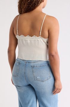 Showcase your sultry style in this flattering cropped camisole trimmed with lovely lace. 20" length (size 1X) V-neck Spaghetti straps 100% polyester Hand wash, line dry Imported V-neck Lace Crop Top With Lace Trim, Chic Cropped Lace Trim Tank Top, Lace Cami Crop Top With Lace Trim, Lace Crop Top Tank With Lace Trim, Lace Crop Top Camisole, Fitted Lace Trim Cami Crop Top, Lace Top Crop Camisole, Lace Crop Top With Lace Trim, Chic Spaghetti Strap Crop Top With Lace Trim