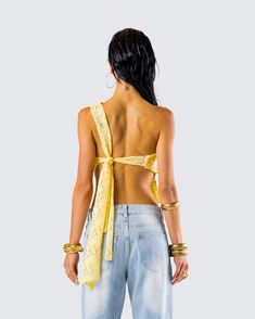 A soul full of sunshine ☀️ Brighten up their days in this yellow top made from lace fabric and complete with strap ties at the back, and an asymmetrical fit 💛 Yellow Triangle Top For Spring, Gold Backless Halter Top For Summer, Gold Crop Top For Summer, Yellow Summer Top With Built-in Bra, Yellow Crop Top With Built-in Bra For Spring, Yellow Crop Top With Built-in Bra For Summer, Summer Yellow Crop Top With Built-in Bra, Festival Tie-back Tops, Summer Festival Tops With Built-in Bra