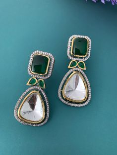 Top quality uncut kundan earring with American diamond work and monalisa top. About 2.5 inch long, push back and super light weight . Elegant Green Kundan Chandelier Earrings, Elegant Green Kundan Tikka, Festive Green Hand Set Earrings, Festive Green Hand-set Earrings, Green Kundan Chandbali Chandelier Earrings, Green Kundan Bridal Earrings With Stone Work, Elegant Green Kundan Earrings, Green Stone Work Temple Jewelry Earrings, Elegant Green Kundan Bridal Earrings