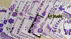 some purple flowers and butterflies are on white cards with the words art studio written below them