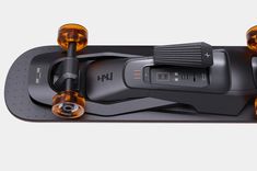 an electric skateboard with wheels and lights on it