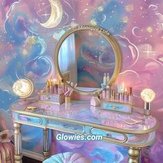 a vanity with a mirror and lights on it in front of a wall mural that has stars and moon designs