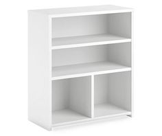 a white book shelf with three shelves