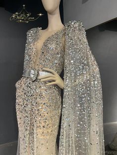 Luxury Sequined Evening Dress, Luxury Evening Dress For Party Season, Luxury Evening Dress With Sequins, Luxury Sequin Dress For Gala, Luxury Sequined Evening Gown, Luxury Evening Gown With Sequins, Luxury Sequin Cocktail Gown, Luxury Sequin Evening Dress For Party Season, Luxury Embellished Evening Dress For Glamorous Events