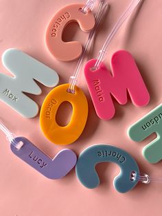 the word mom spelled out in different colors