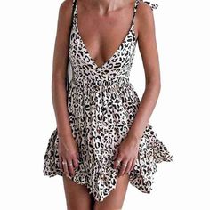 Backless V-neck Low-cut Print Flowery Party Mini Dress V-neck Mini Dress With Straps For Day Out, V-neck Sundress For Night Out, Summer V-neck Sundress With Straps, V-neck Mini Dress With Straps For Date Night, V-neck Sundress Mini Dress For Party, Flirty V-neck Sundress For Beach, V-neck Sundress For Beach Party, Beach V-neck Dress With Straps, V-neck Mini Dress For Summer Date Night