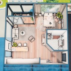 an overhead view of a small house with the living room and dining area separated by a pool