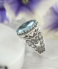 Ladies, from casual dates to fancy parties and weddings, our 925 Sterling Silver Filigree Art Cocktail Ring is an ideal gift choice for women who loves jewelry. Whether you're a gem lover or a wearer of handcrafted jewelry, this ring will surely delight you with its designer's artistry and craftsmanship. We have carefully handpicked various stones that are used in making this ring so that it reflects both your taste as well as personality. This ring features Amethyst, Blue Topaz, Carnelian, Ruby Luxury Filigree Topaz Ring For Formal Occasions, Silver Heart Cut Topaz Ring Gift, Heart Cut Silver Topaz Ring For Gift, Elegant Heart Ring Stamped 925, Elegant Stamped 925 Heart Ring, Filigree Topaz Ring Gift, Blue Elegant Heart Ring For Gift, Elegant Blue Heart Ring For Gift, Gift Topaz Ring With Intricate Design