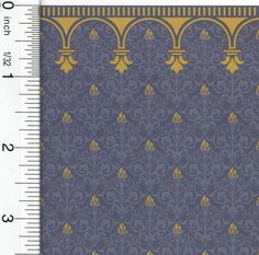 a ruler with a purple and gold pattern on it