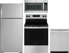 a silver refrigerator freezer sitting next to a stove top oven