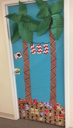 a door decorated with palm trees and decorations