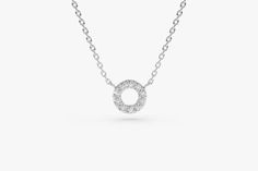 Diamond Circle Necklace / 14k Gold Mini Diamond Circle / Open Circle Necklace / Layering Diamond Necklace / Bridesmaid Gift / Gift for Her Features * Made to Order. * Gold KT: 14K * Choice of Gold Color: Rose Gold, Yellow Gold, White Gold * Height & Width: 7MM x 7MM * Round Diamond: 10 pcs 1.25MM * Total CTW: 0.10ctw * Diamond Color-Clarity: G Color Si Clarity * Setting Type: Prong * Ready to Ship in 7-10 Business Days ▶ Want to find out more? Check out my shop http://etsy.me/2lUcVnH ▶ Want Layering Diamond Necklaces, Diamond Circle Necklace, Open Circle Necklace, Special Necklace, Necklace Layering, Circle Diamond, Gold Diamond Necklace, Everyday Necklace, Circle Necklace