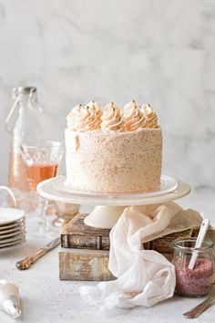 a white cake sitting on top of a table